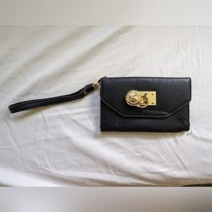 Michael kors wristlet black and gold